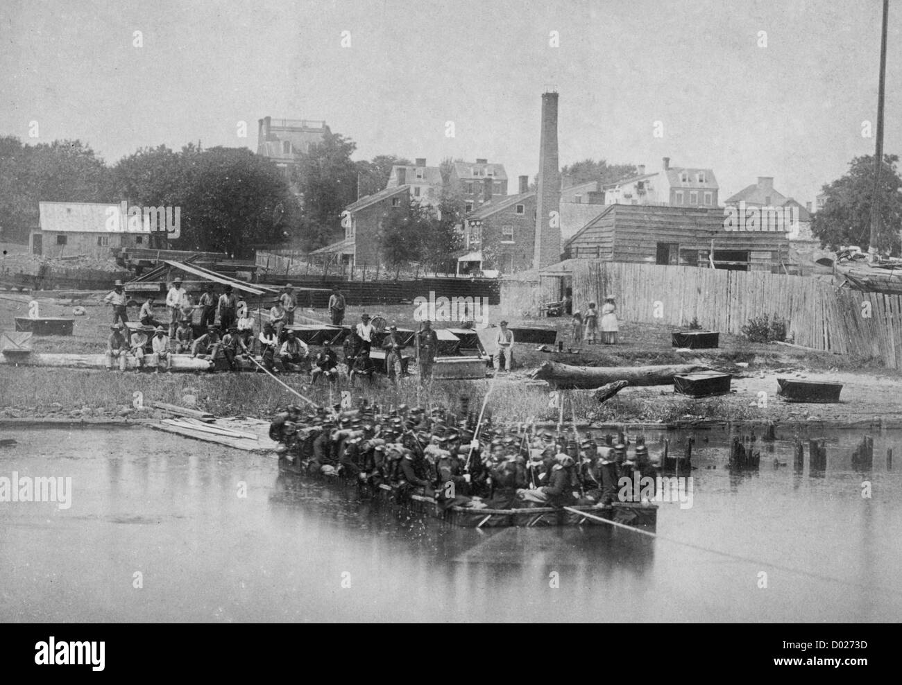 Military construction in northern Virginia: raft of blanket boats ferrying soldiers across the Potomac River, USA Civil War, circa 1862 Stock Photo