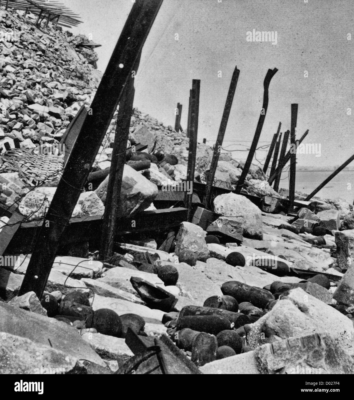 Outside view, Fort Sumter, 1865 Photograph shows ruins of artillery among the rocks on the exterior of Fort Sumter. Stock Photo