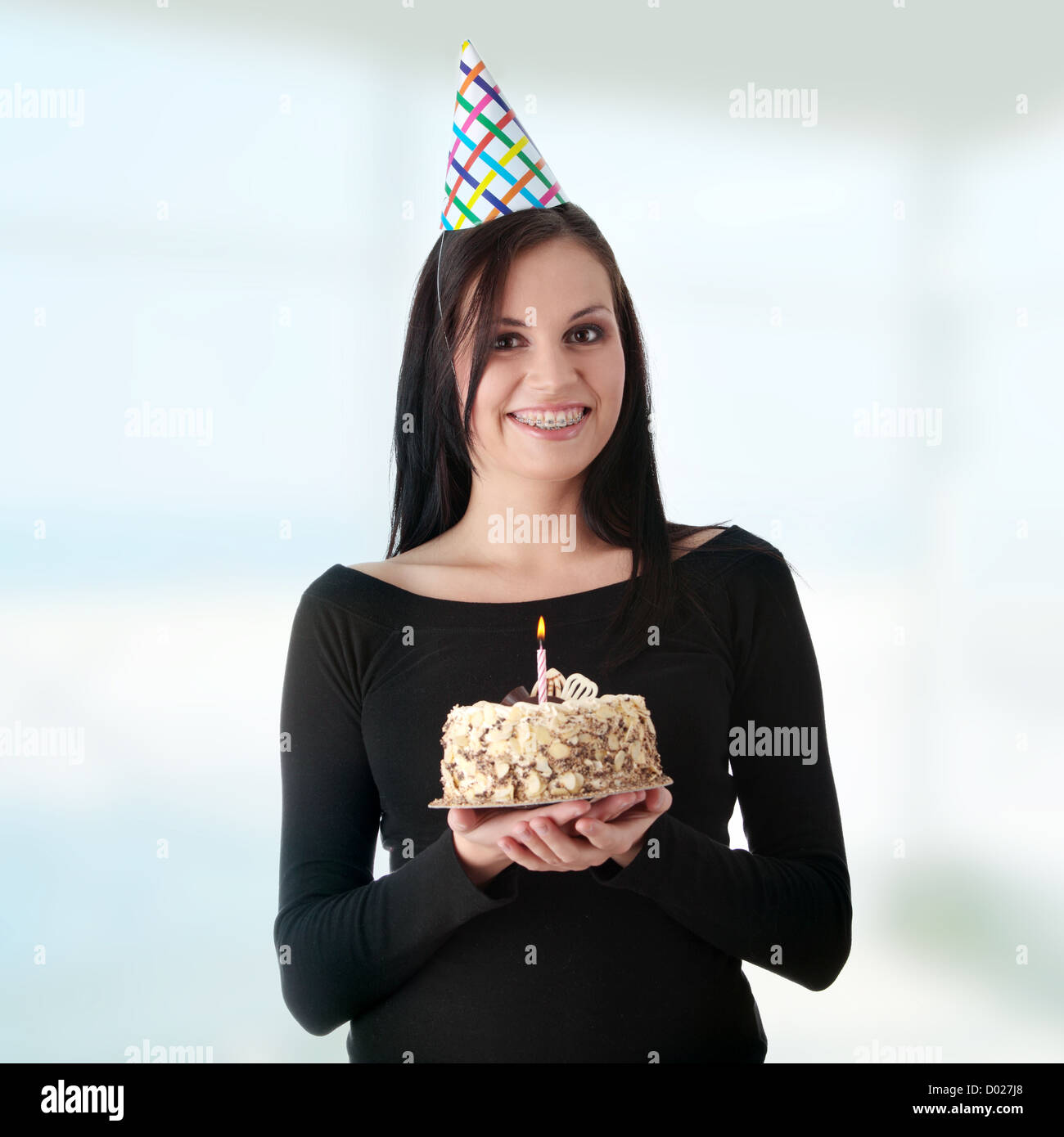 Beautiful young woman with birthday cake Stock Photo Alamy