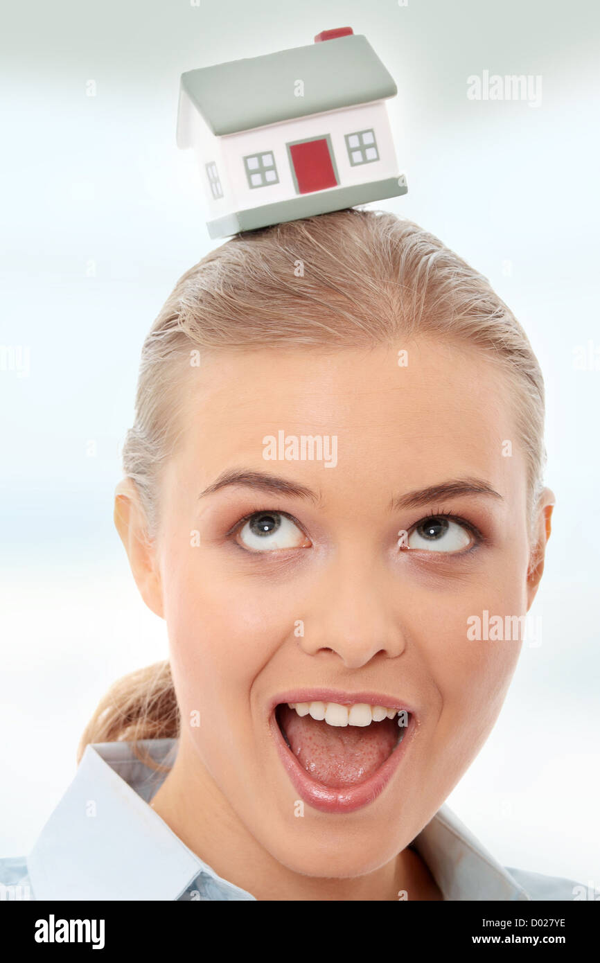 Young beautiful business woman with house model - real estate Stock ...