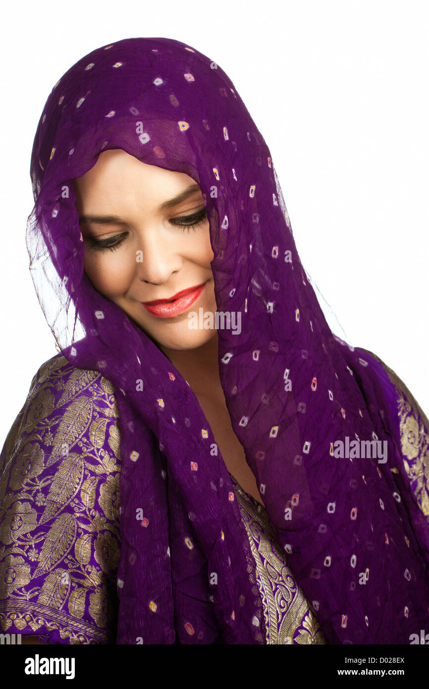Beautiful young Indian or asian woman wearing a head scarf Stock Photo
