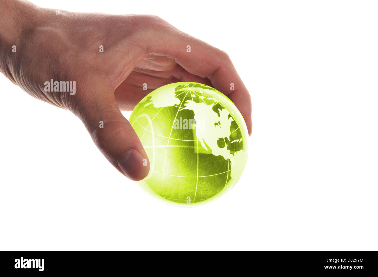 hand holding globe to protect the fragile environment Stock Photo