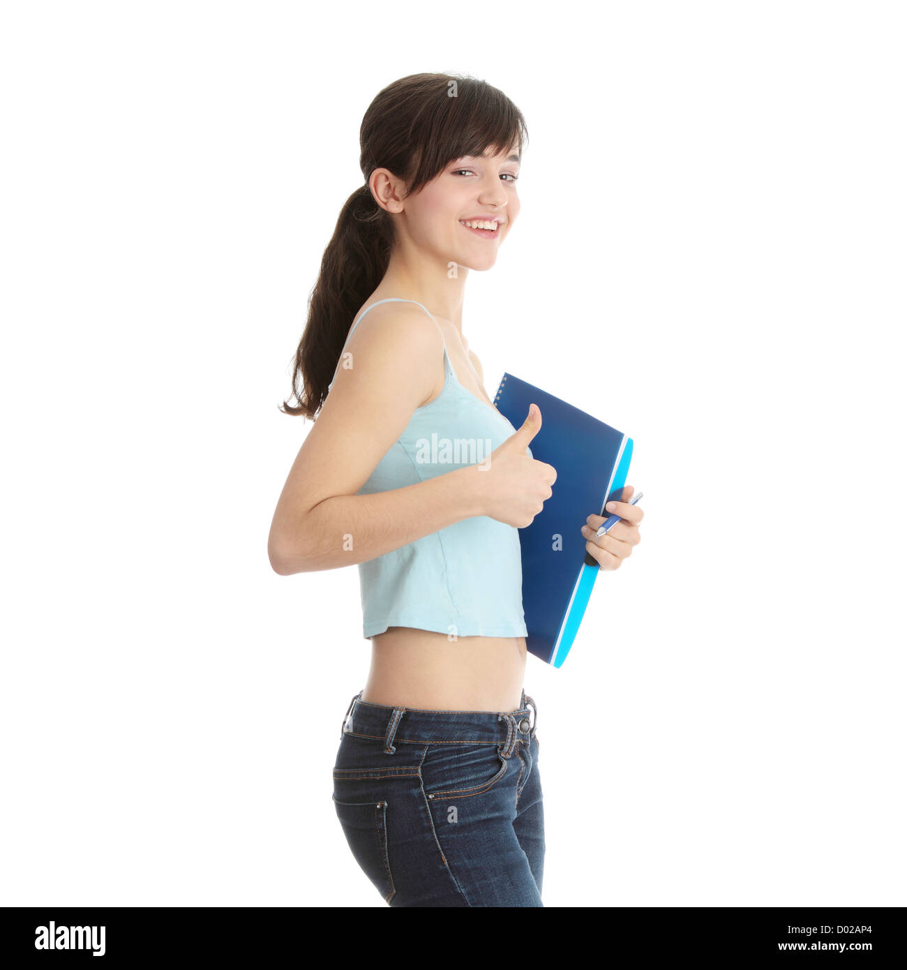 Young student girl with thumb up Stock Photo - Alamy