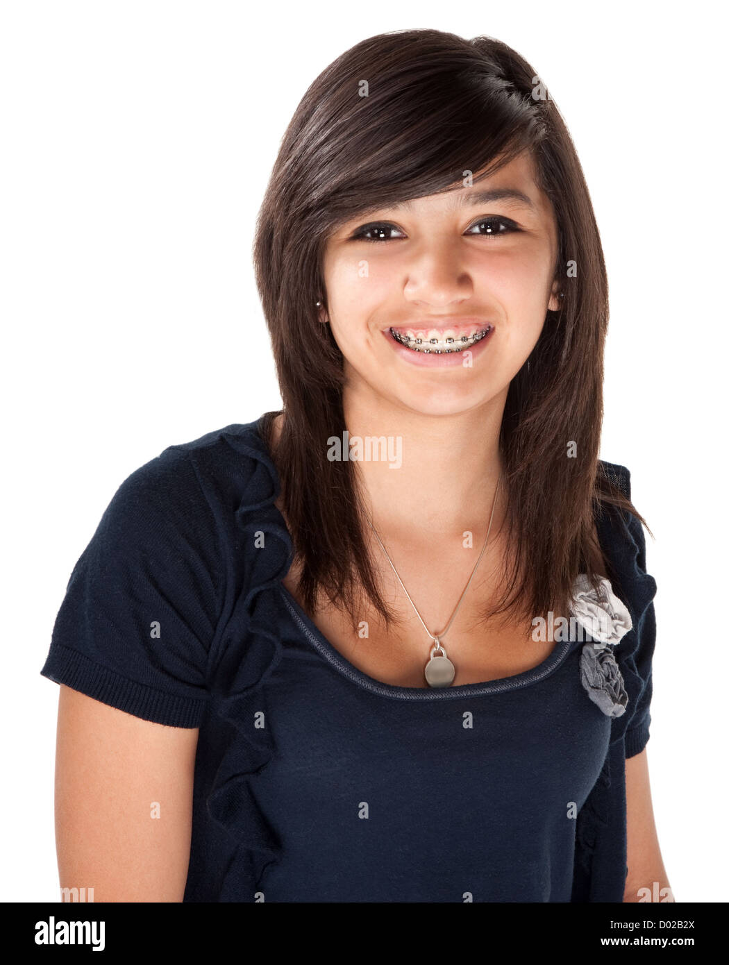 Cute Hispanic teenage girl with braces and a big smile Stock Photo