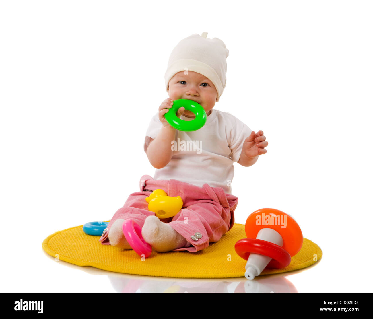 Six month Baby playing with toys isolated on white Stock Photo - Alamy
