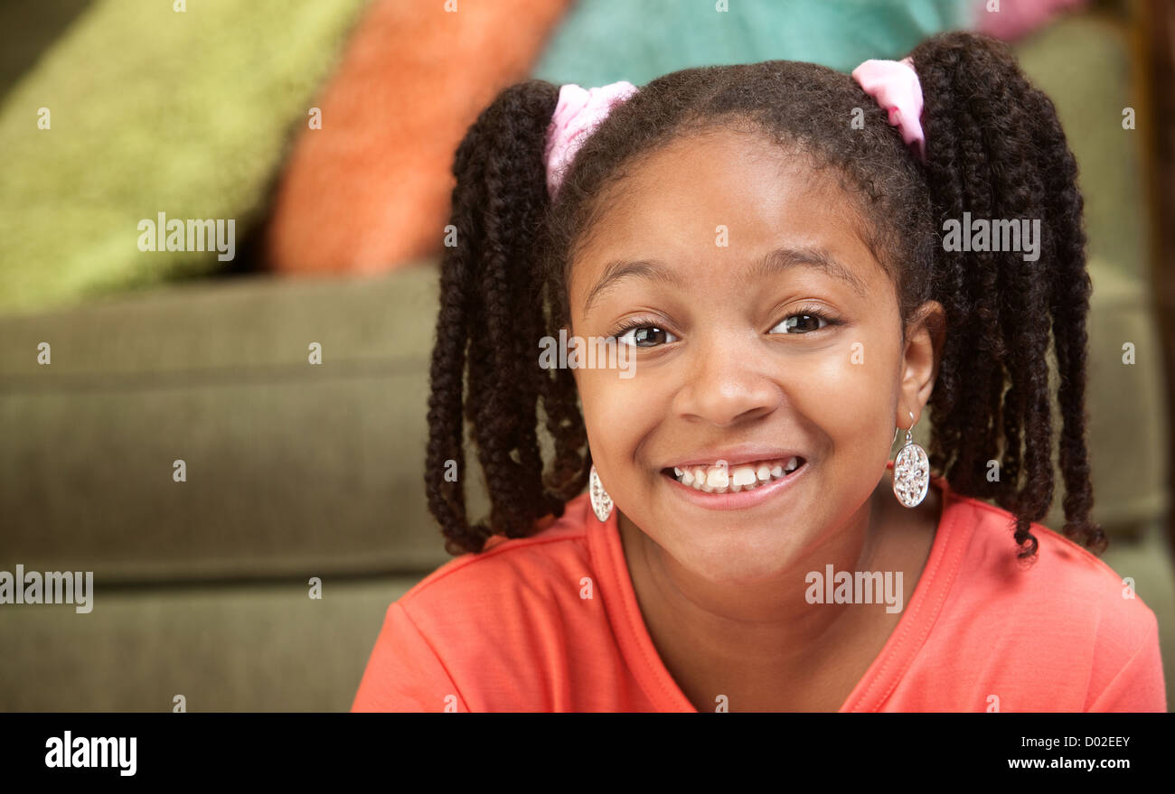 Happy African American girl in her room Stock Photo - Alamy