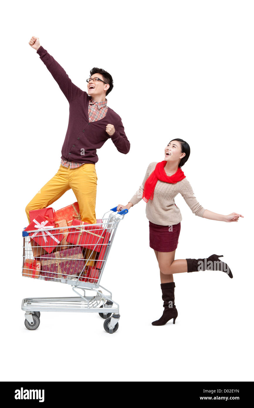 Happy young couple shopping in Chinese New Year Stock Photo - Alamy