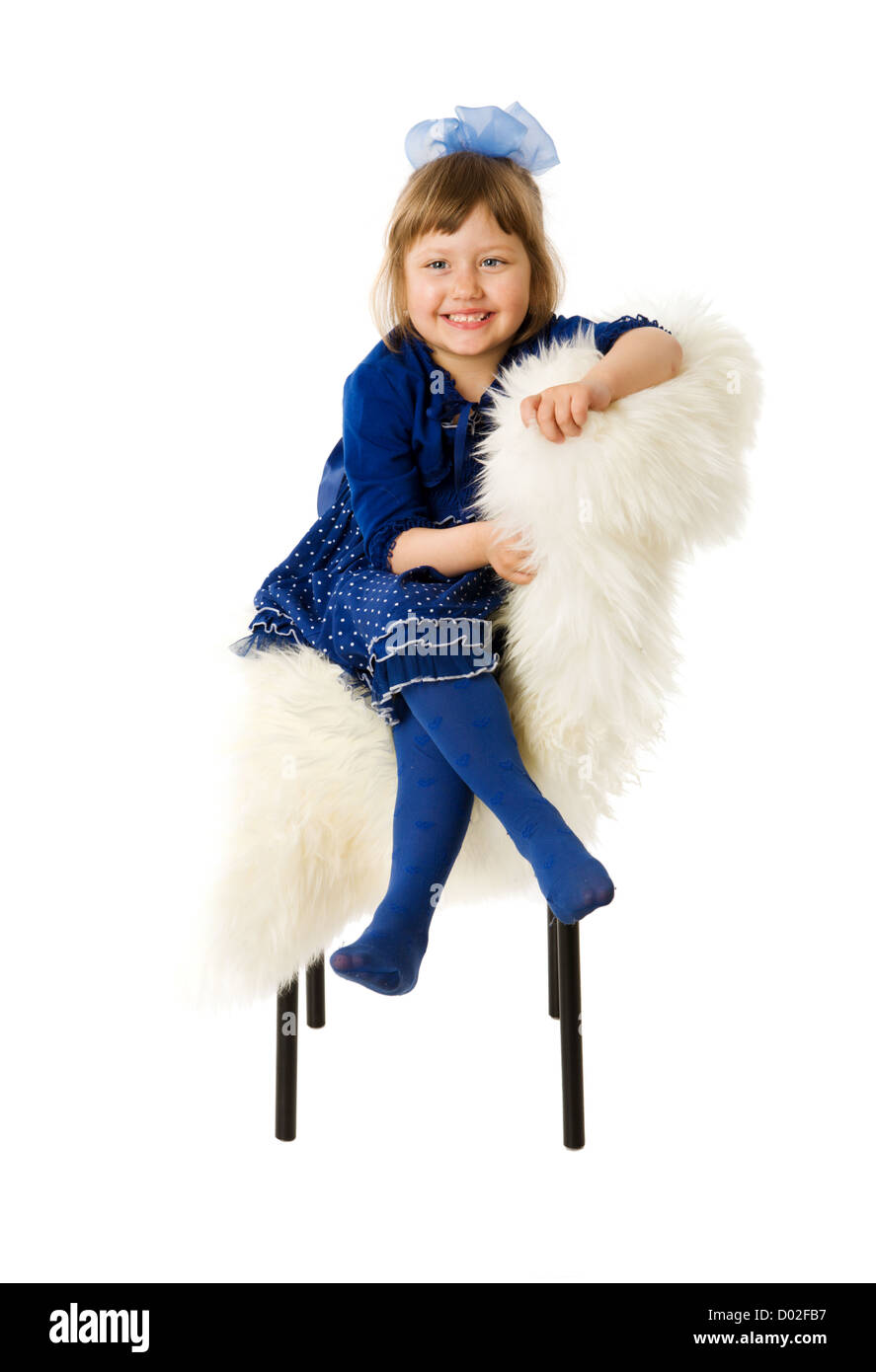 Happy girl smiling sitting isolated on white Stock Photo - Alamy