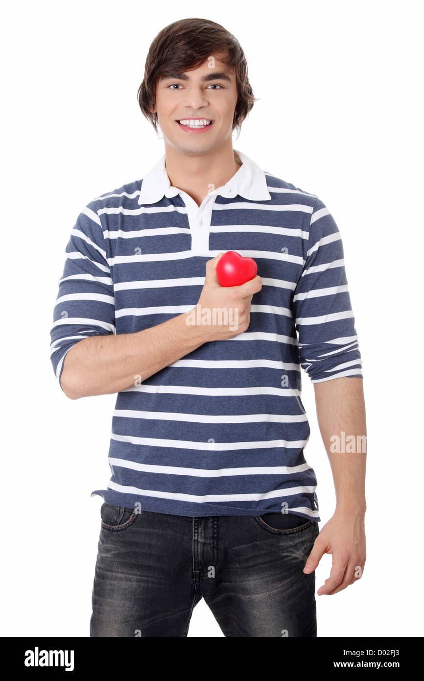 Young man with heart. Isolated on white background Stock Photo - Alamy