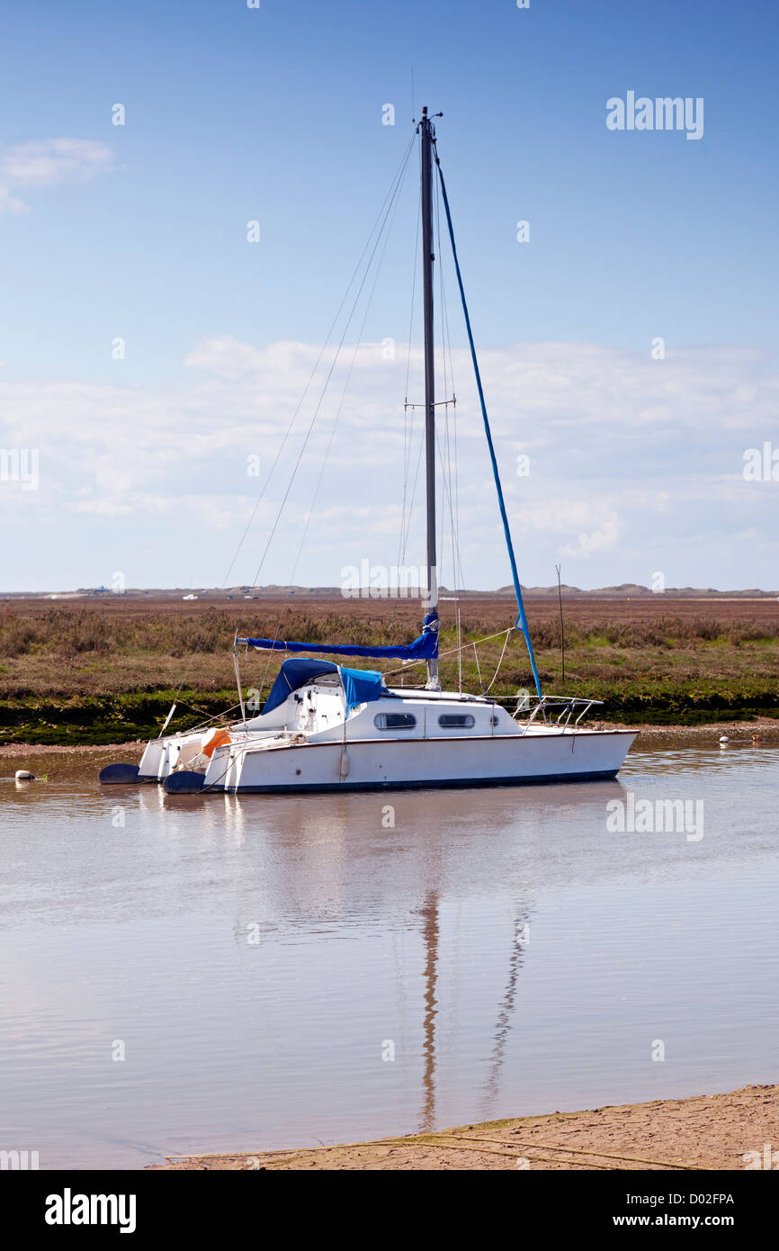 Twin Hull Yacht moored in creek at Blakeney Norfolk Stock Photo Alamy