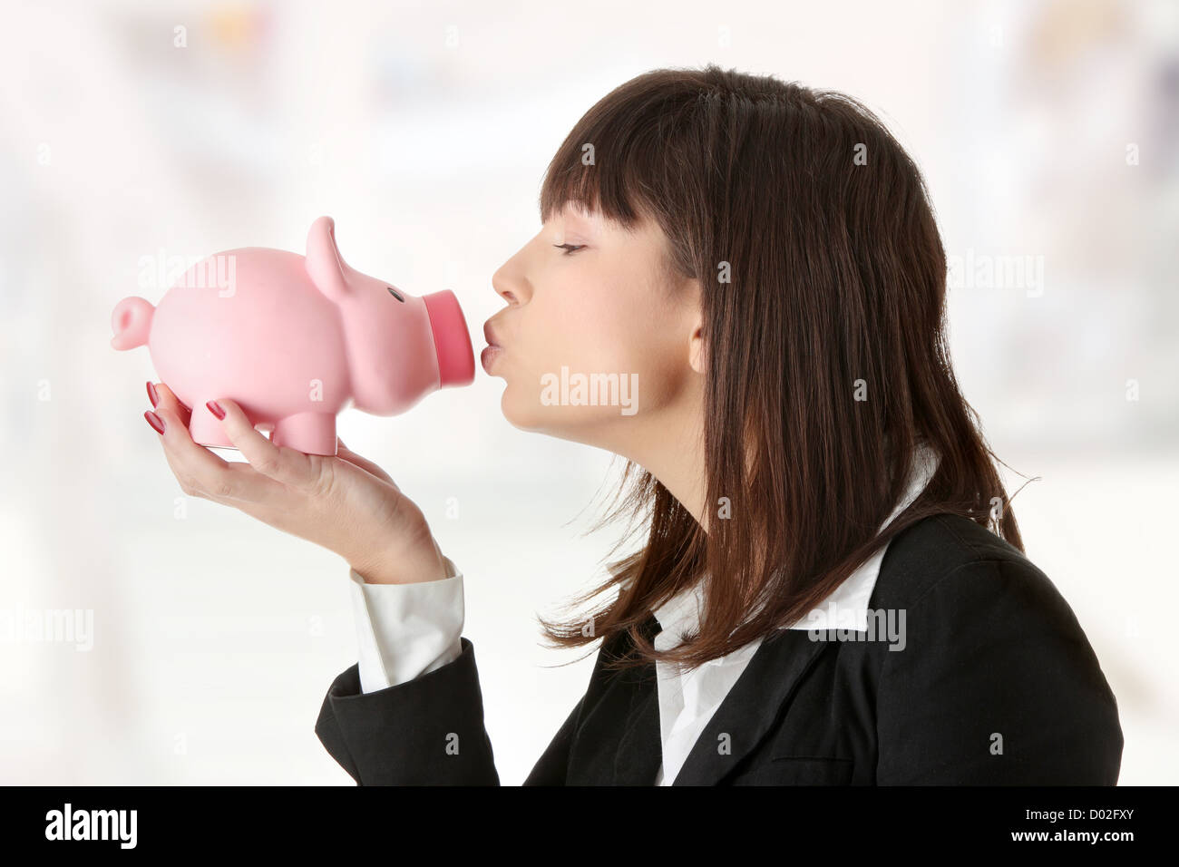 Woman Holding Piggy Bank Stock Photo - Alamy