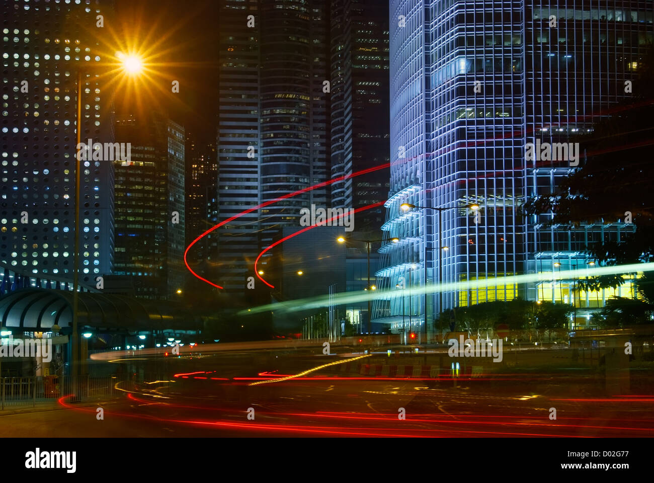 Night scene of modern city with cars motion blurred Stock Photo - Alamy