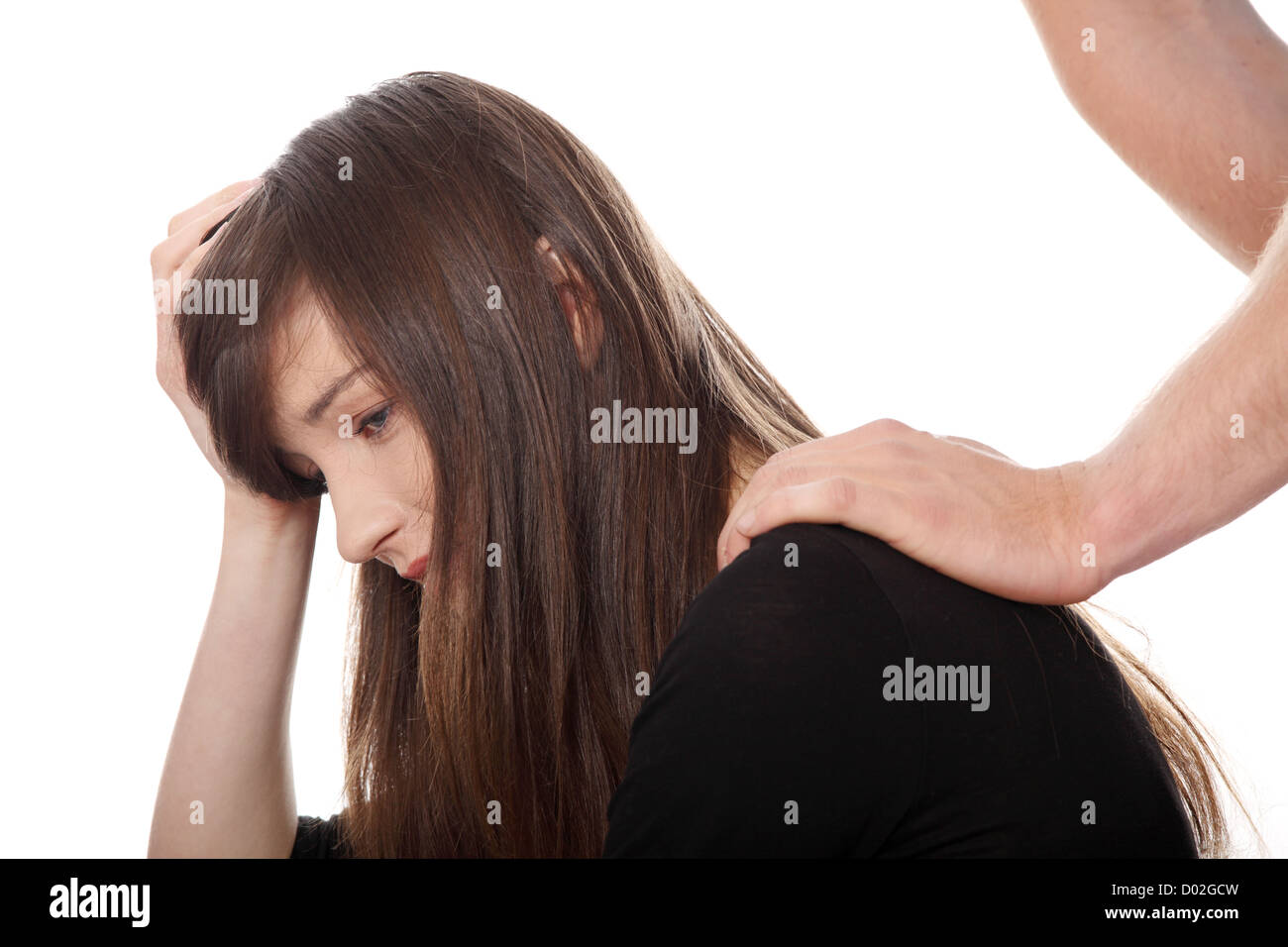 Troubled young girl comforted by her boyfriend Stock Photo - Alamy