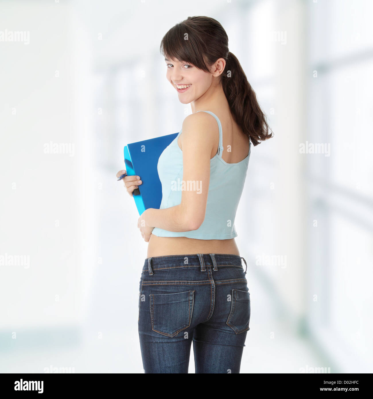 Teen student girl isolated on white background Stock Photo - Alamy