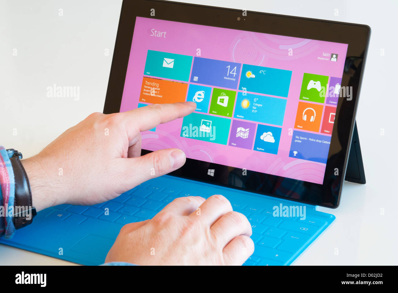 Microsoft Surface rt tablet computer with blue keyboard Stock Photo