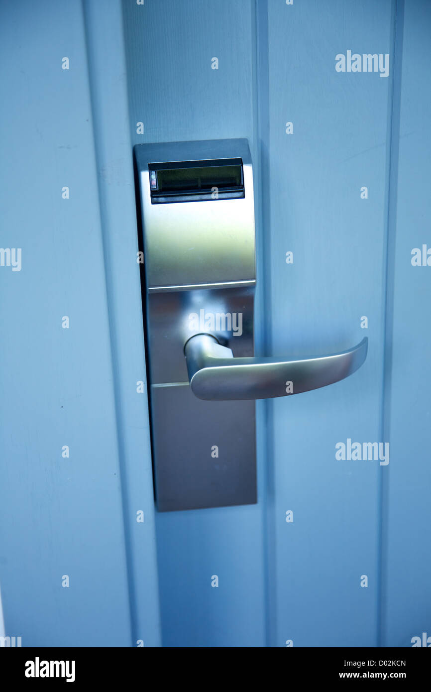 metal lock-card and handle on blue wood door Stock Photo - Alamy