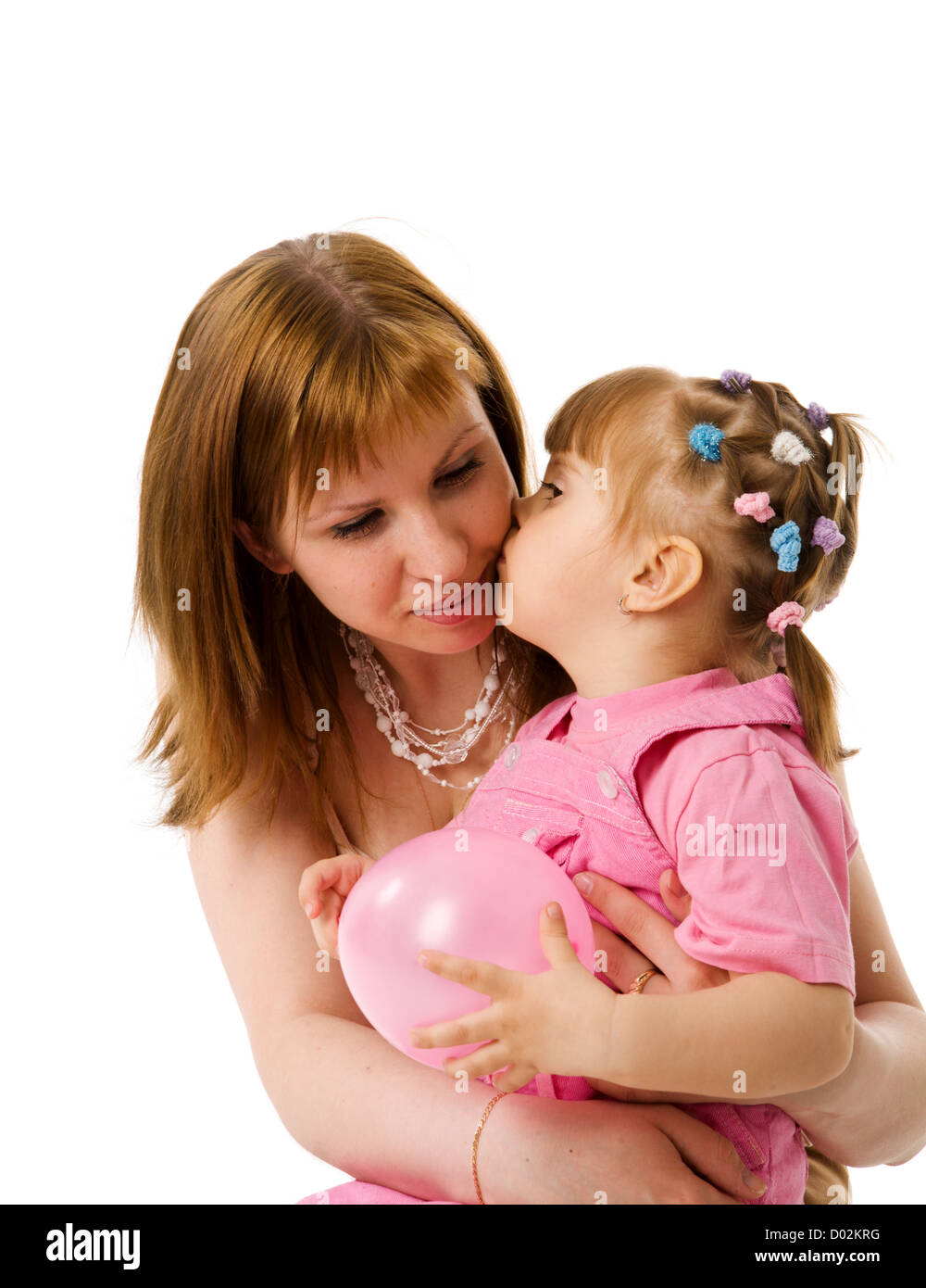 Little girl Kissing mother isolated on white Stock Photo - Alamy