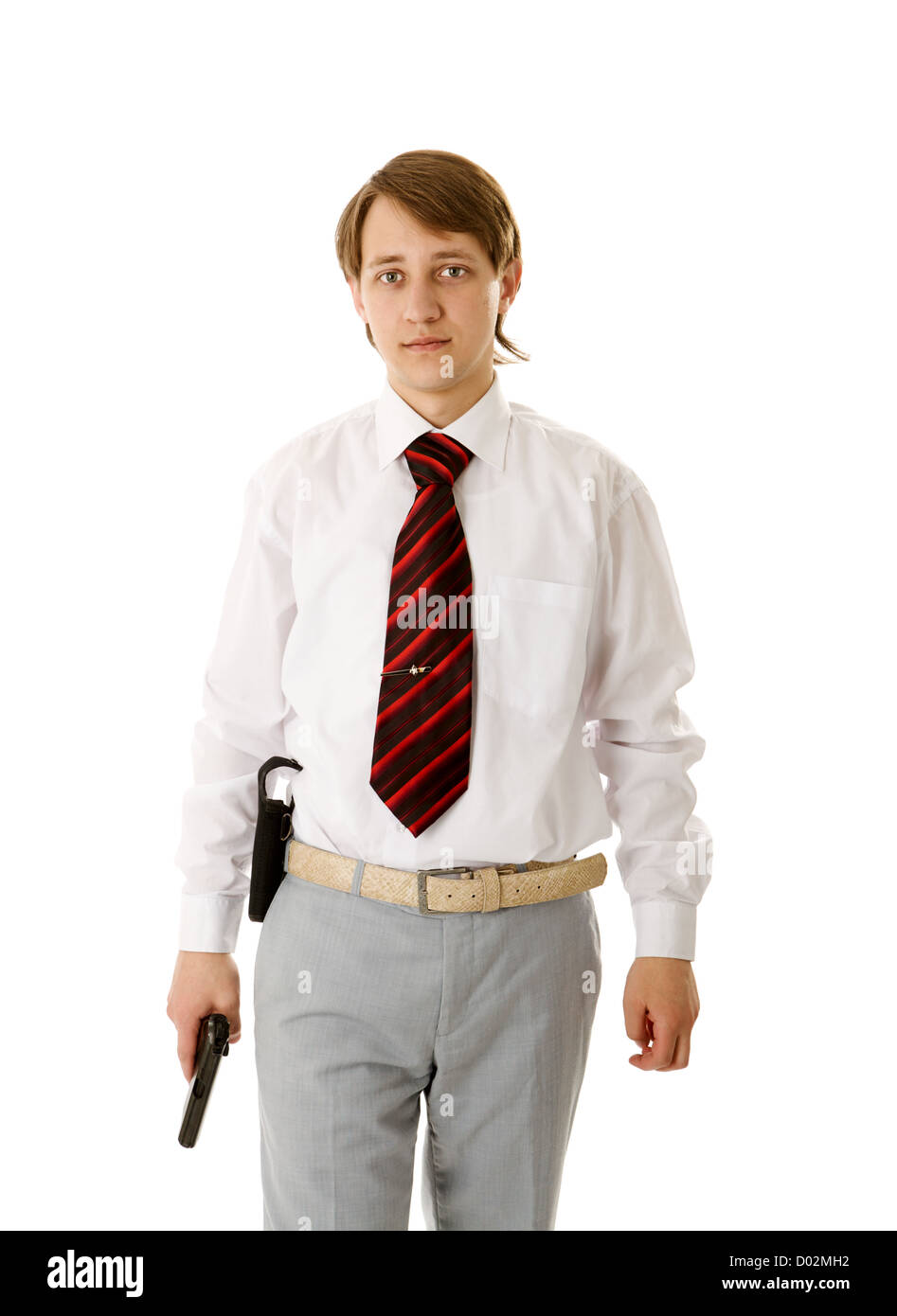 Portrait of handsome Young man holding gun isolated Stock Photo