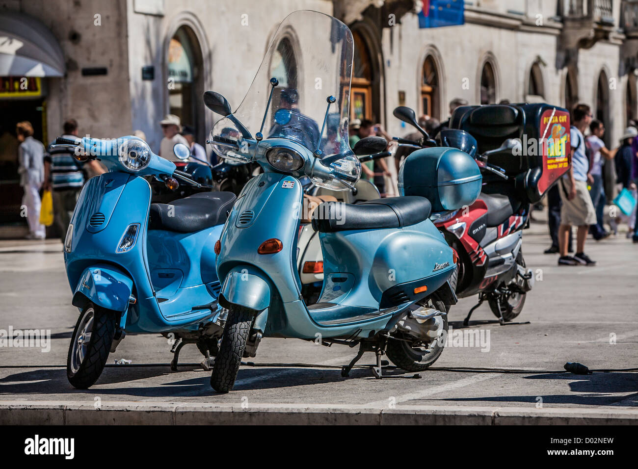 Scooters parked by the coast of the Croatian National Revival Stock Photo