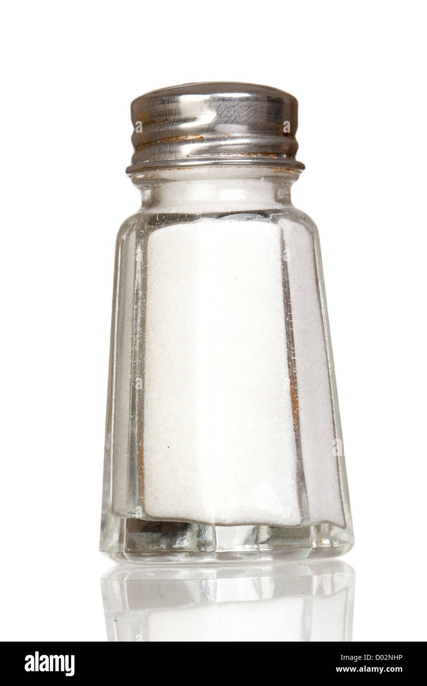 Salt shaker glass with reflection isolated on white background Stock