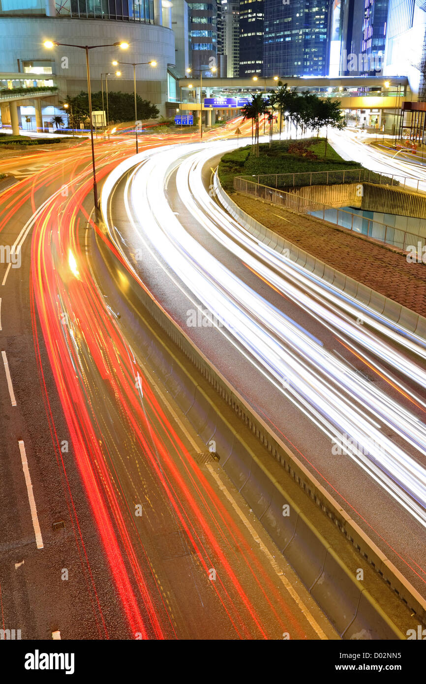 Troaught traffic trought downtown at night Stock Photo - Alamy