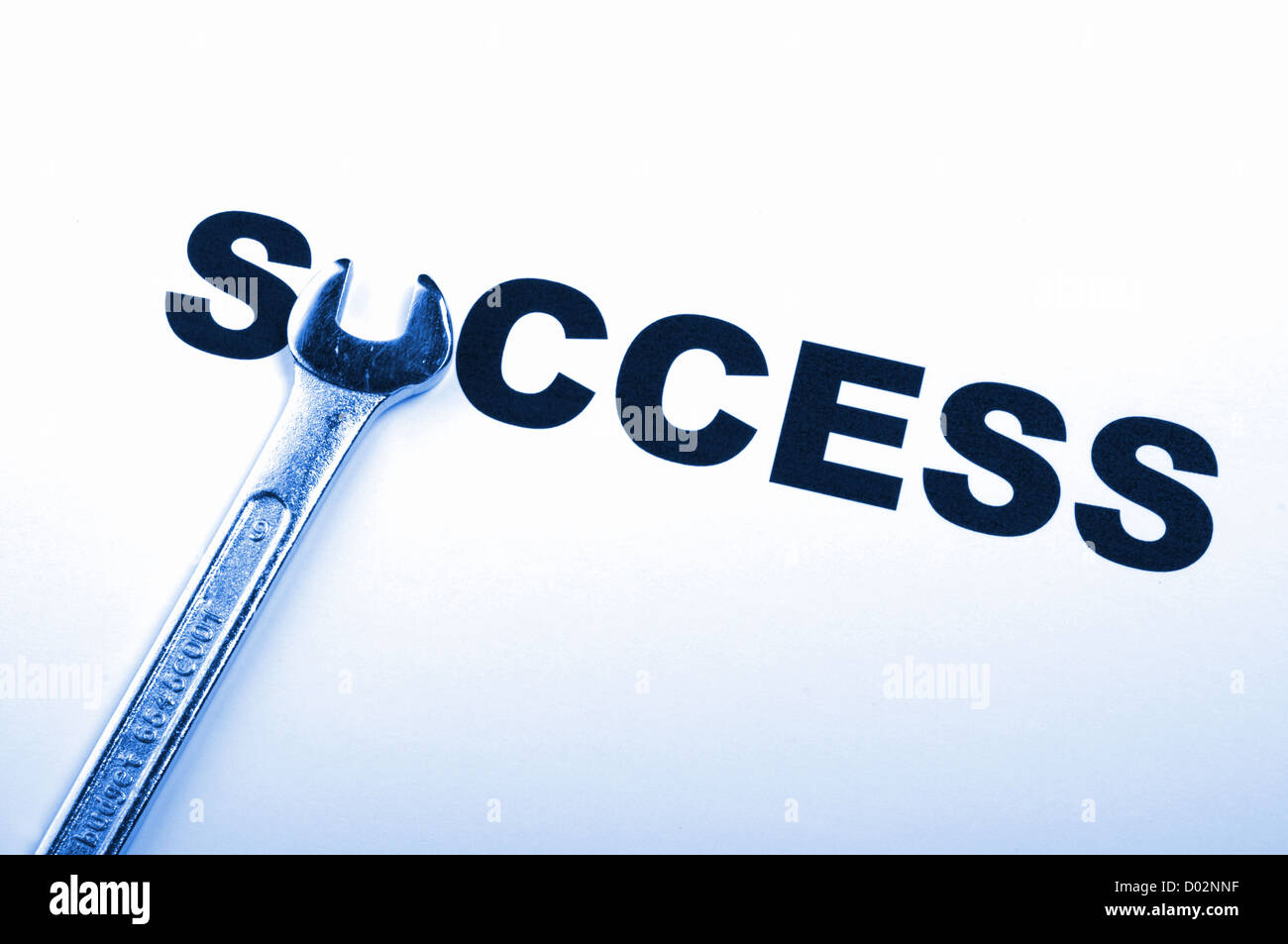 success concept with word and tool showing business growth Stock Photo