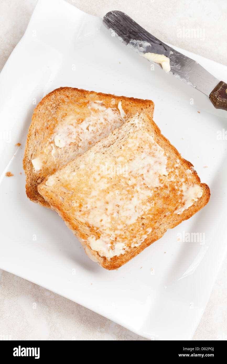 Toast with butter Stock Photo Alamy