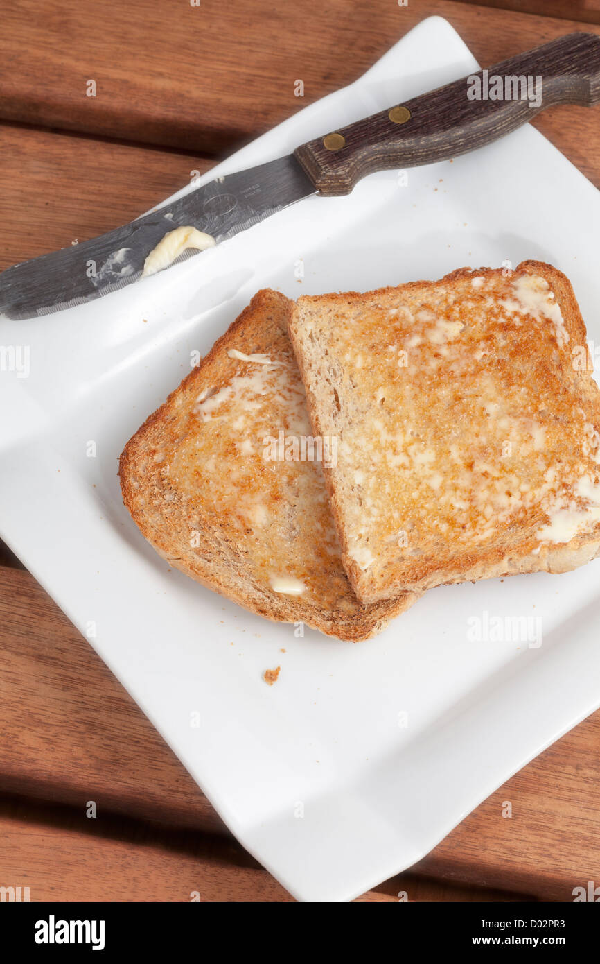 Toast with butter Stock Photo Alamy