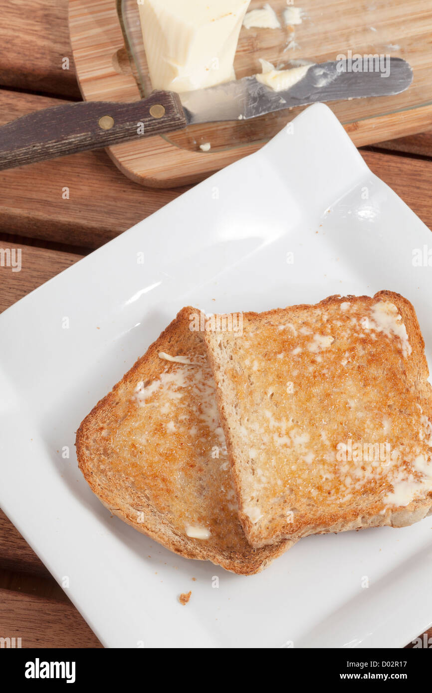 Toast with butter Stock Photo Alamy