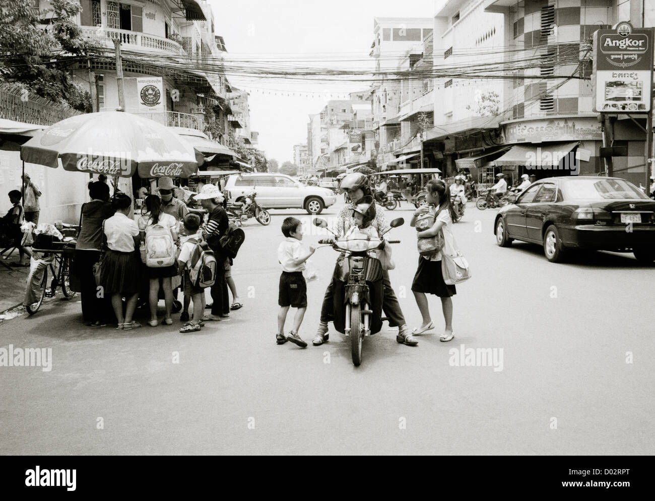 Travel Photography - Street scene in Phnom Penh in Cambodia in Indochina in Southeast Asia Far East. Real People Life Lifestyle Family Stock Photo