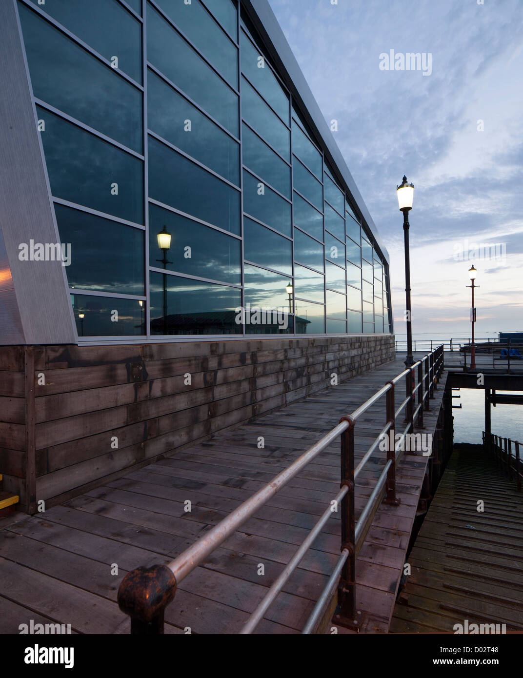 Southend Pier Cultural Centre, Southend, United Kingdom. Architect: White Architects, 2012. Twilight exterior looking towards th Stock Photo