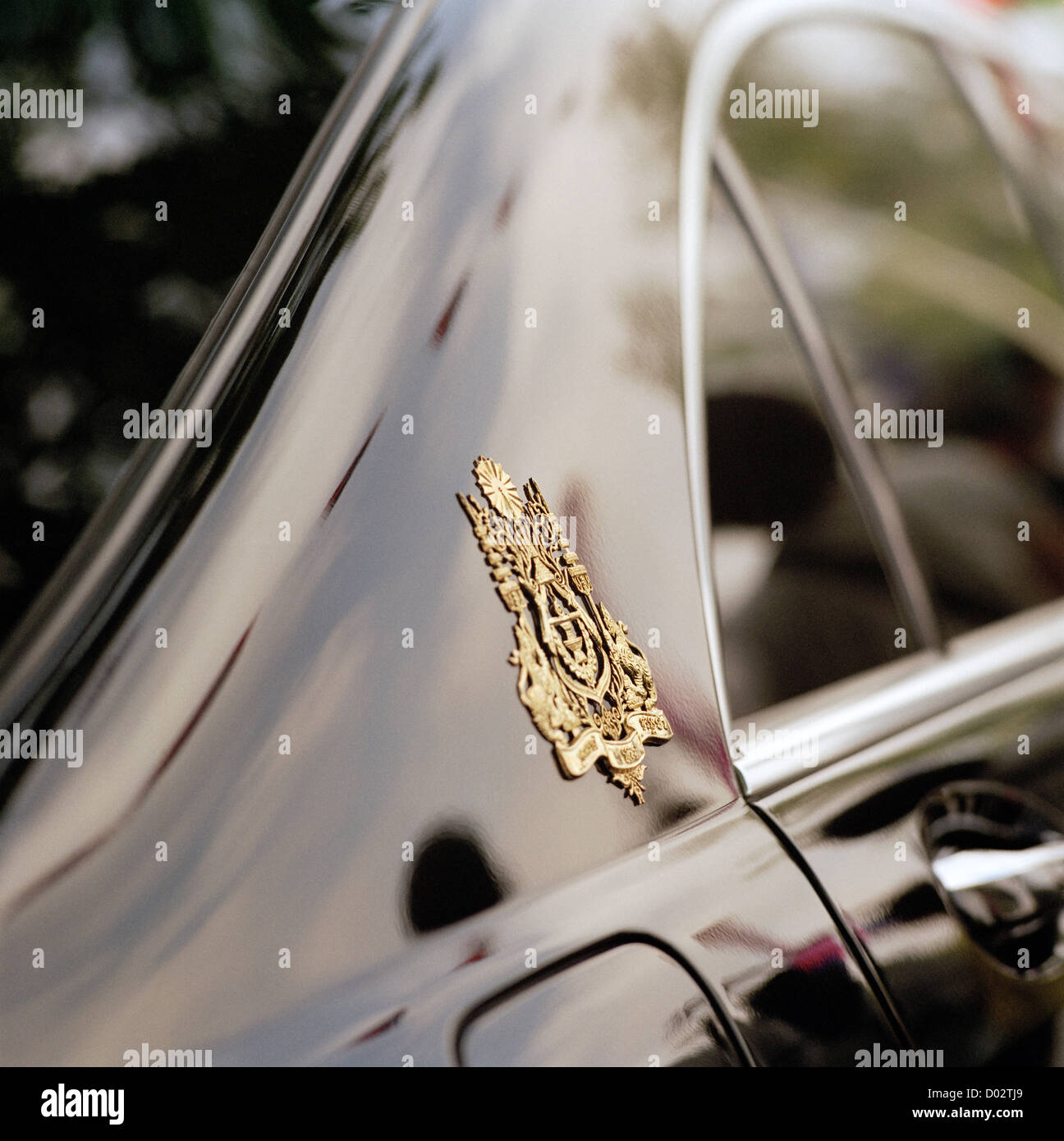 Cambodian royal crest on the car of the King in Phnom Penh Cambodia in Far East Southeast Asia. Monarch Cars Motif Logo Royalty Insignia Art Travel Stock Photo