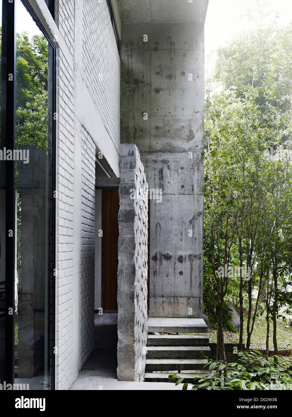 Dog Concrete House, Kuala Lumpur, Malaysia. Architect Kevin Low, 2012. View of entrance from