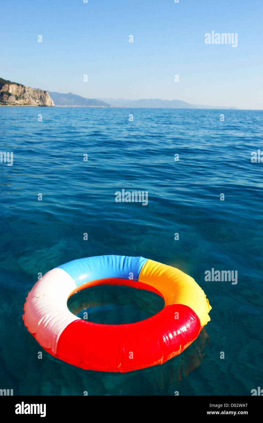 swim ring floating on beautiful blue water Stock Photo Alamy