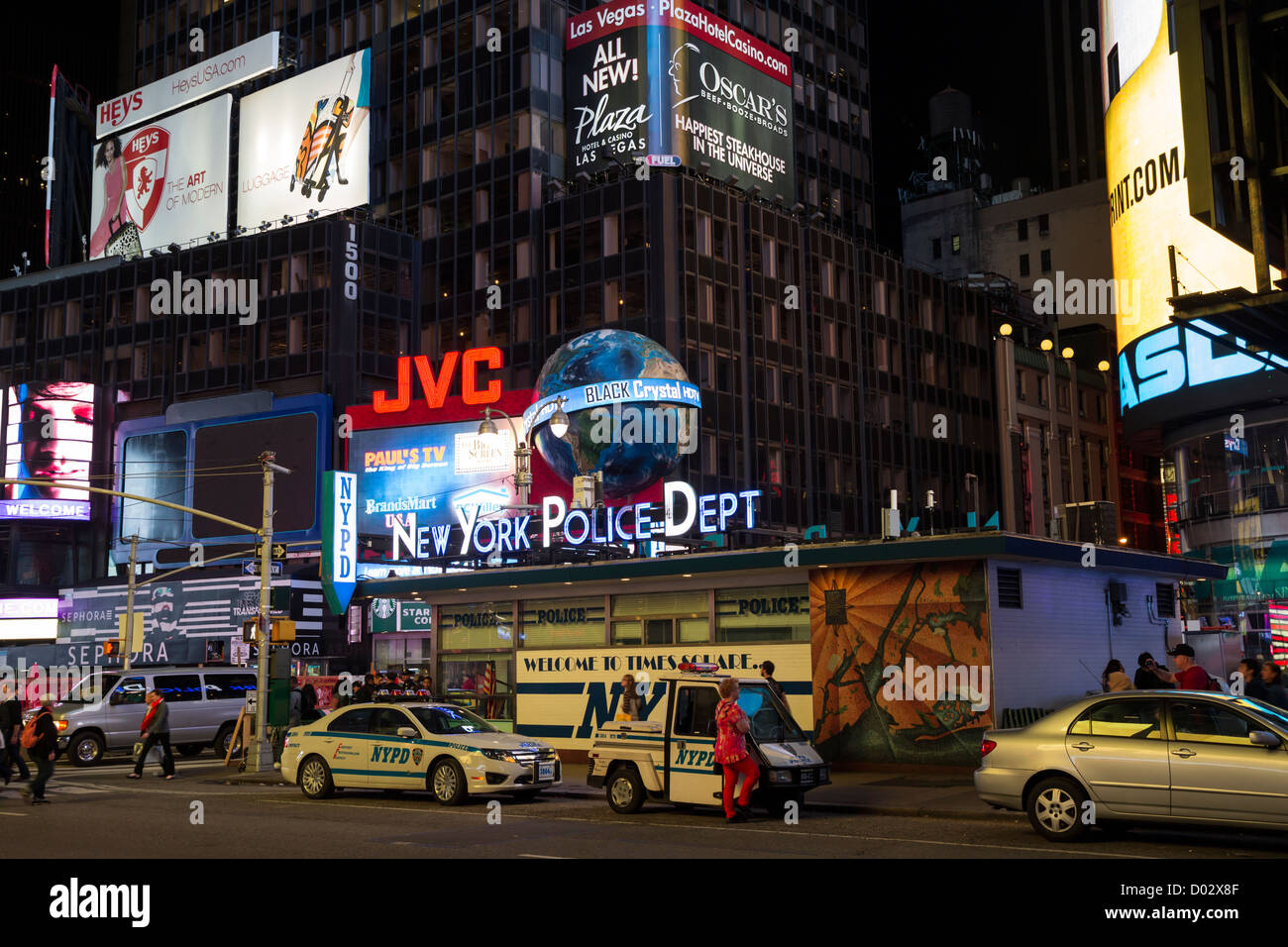 New York Police Dept at Time square by night Stock Photo - Alamy