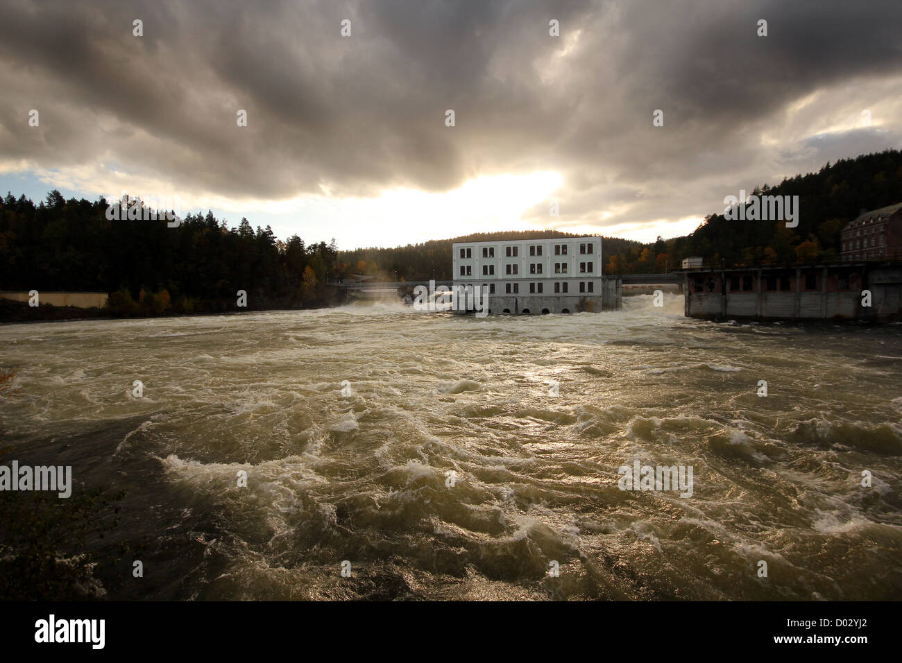 The water is flowing by the power plant.Skotfoss in south Norway Stock Photo
