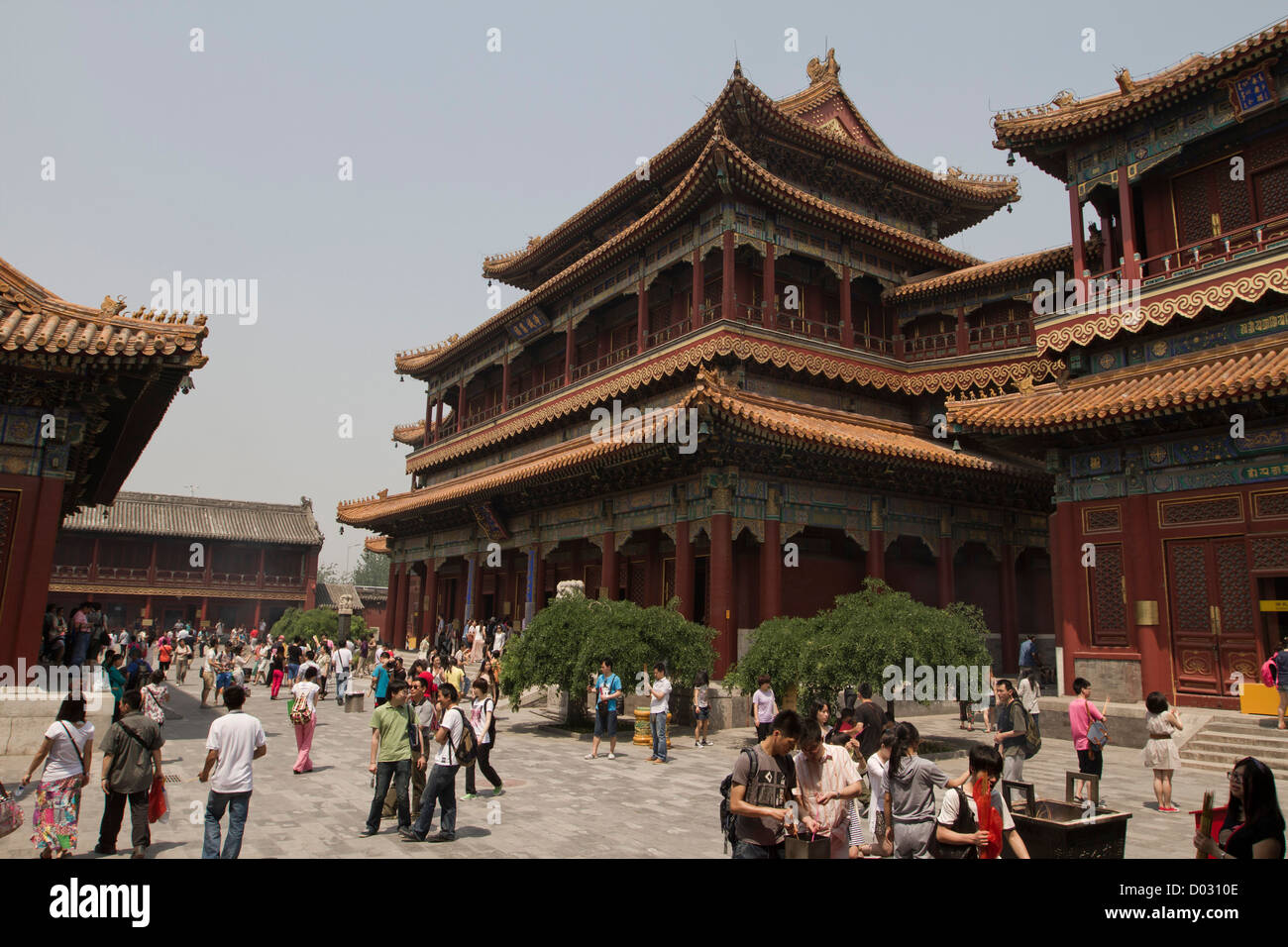 Visitors mingling outside the temples at the Lama Temple in Beijing, China. Stock Photo