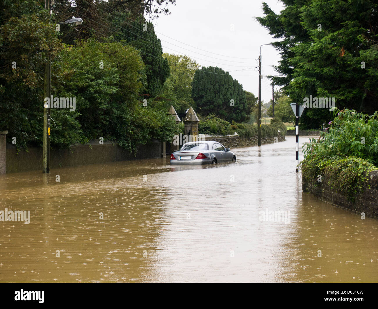 Heavy rain in mid-September 2012 led to this flood in Skerries, county Dublin, Ireland with a car stuck in it Stock Photo