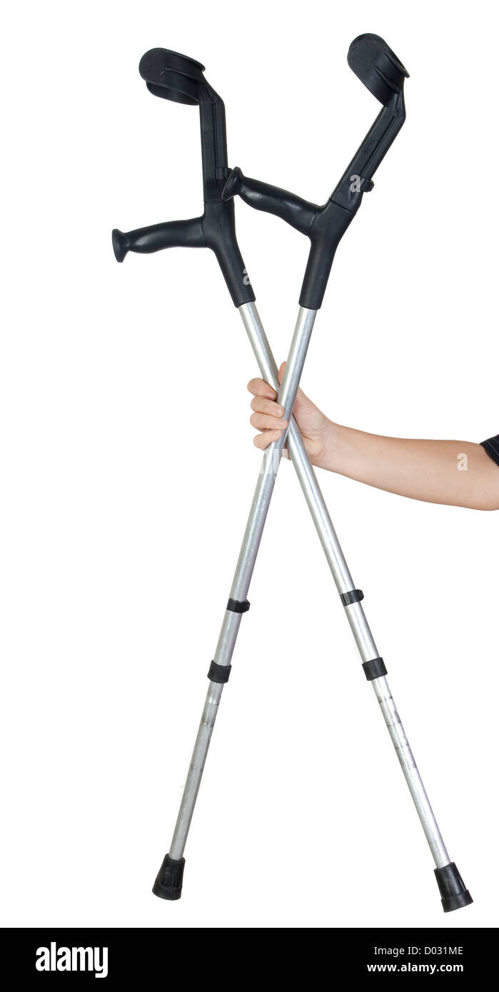 Hand offering a pair of crutches on a white background Stock Photo