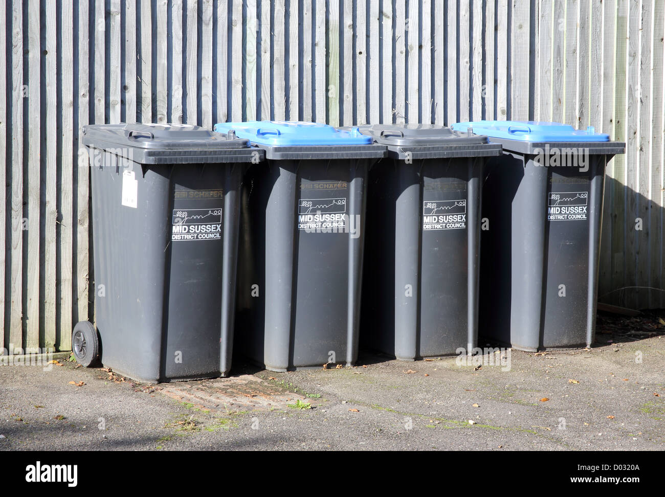 rubbish bins owned by mid sussex district council Stock Photo