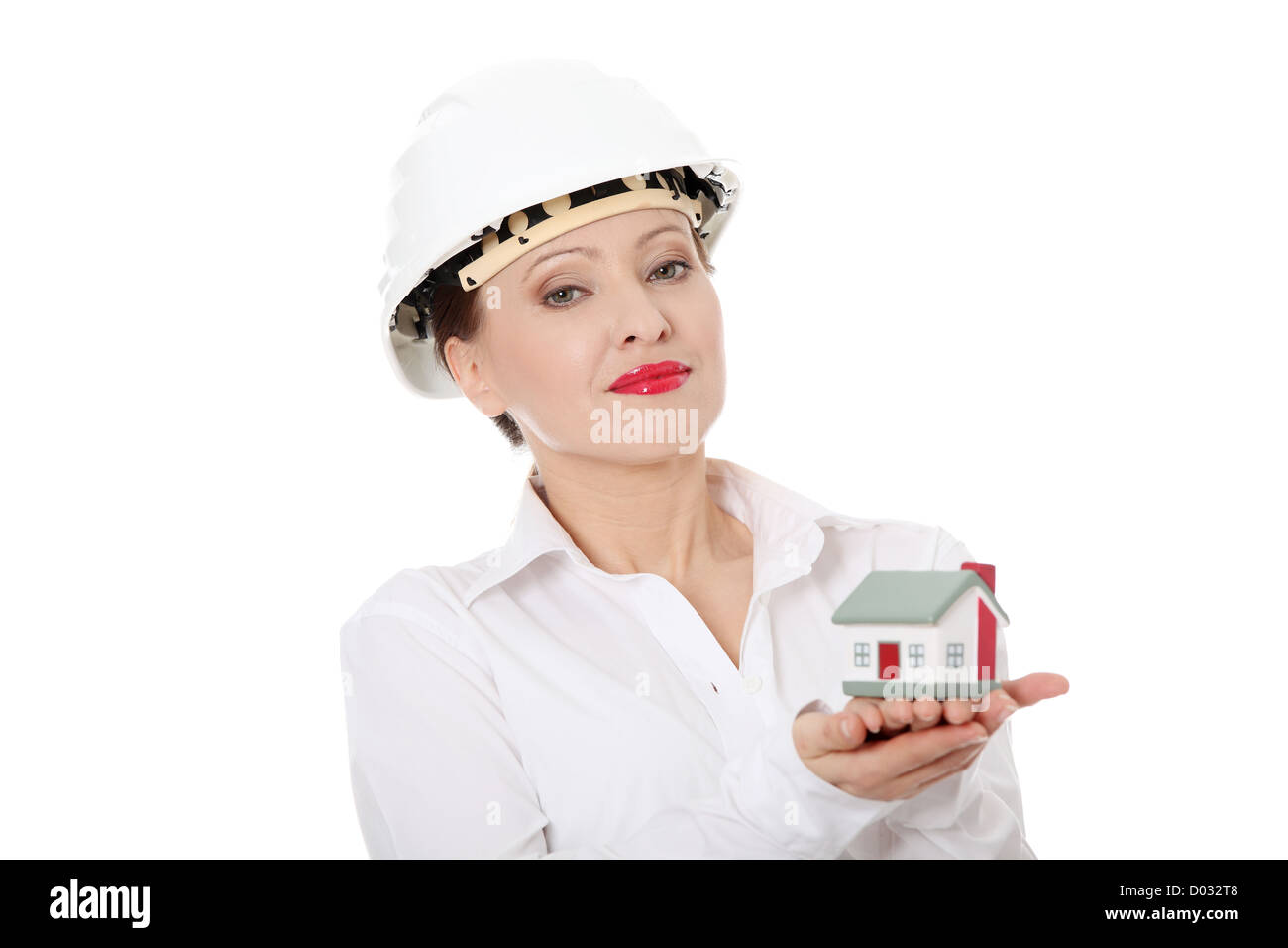 Mature beautiful business woman with house model - real estate Stock ...