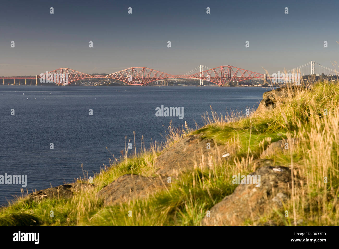 View from Downing Point Dalgety Bay  of  the Forth Bridges. Stock Photo
