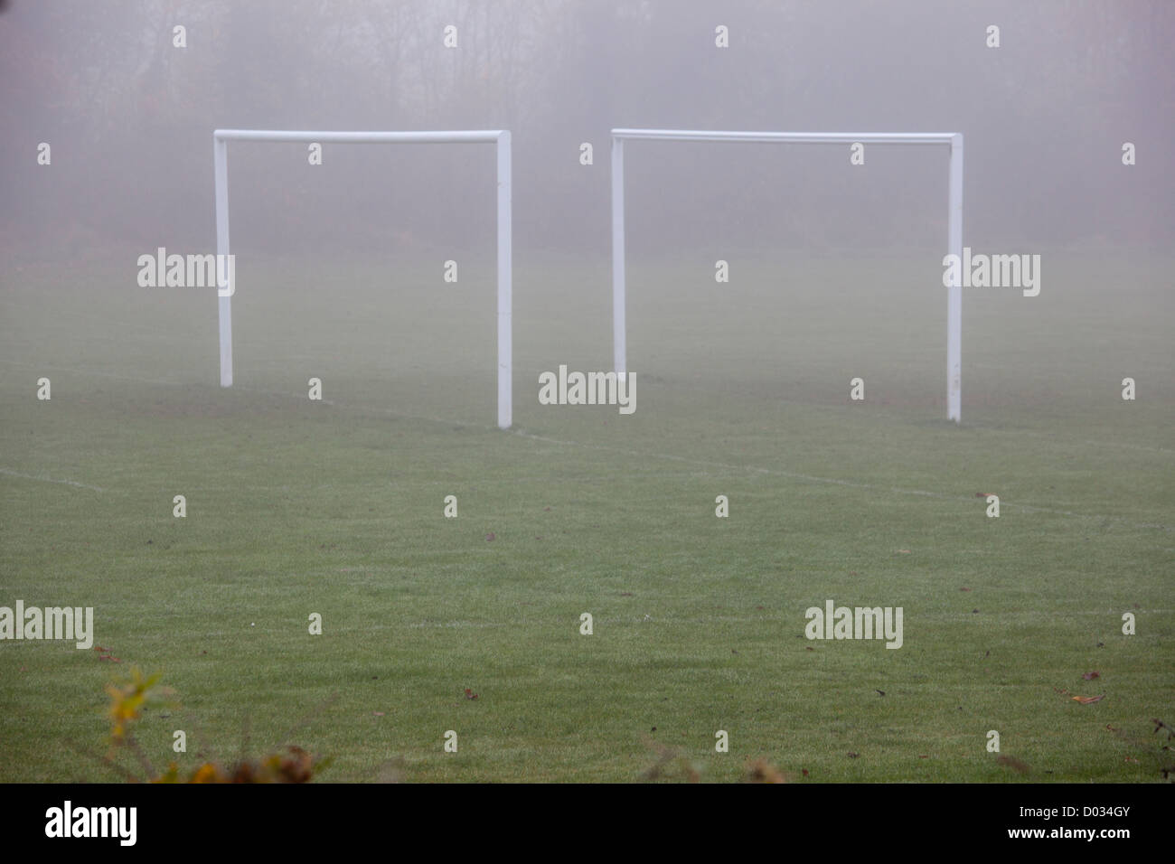 football goalposts in the mist Stock Photo