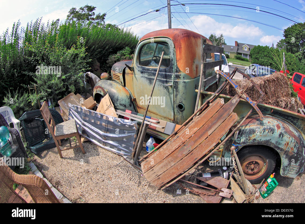 Rusted pickup truck at antique and country store on the north fork of eastern Long Island New York Stock Photo