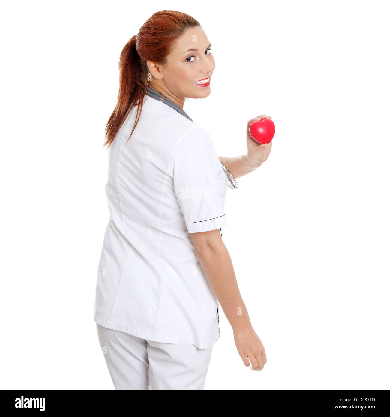 Female doctor with stethoscope holding heart Stock Photo - Alamy