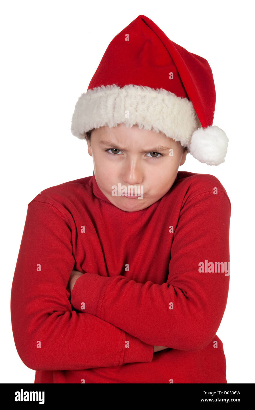 Frowning boy with santa hat isolated on white background Stock Photo ...