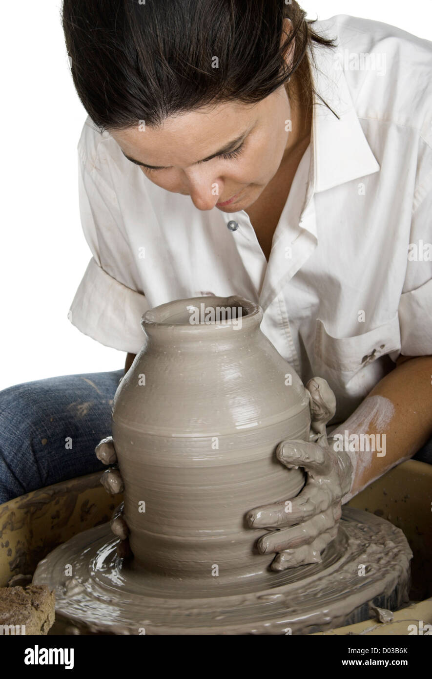 Picture of a potter works a potter's wheel Stock Photo Alamy