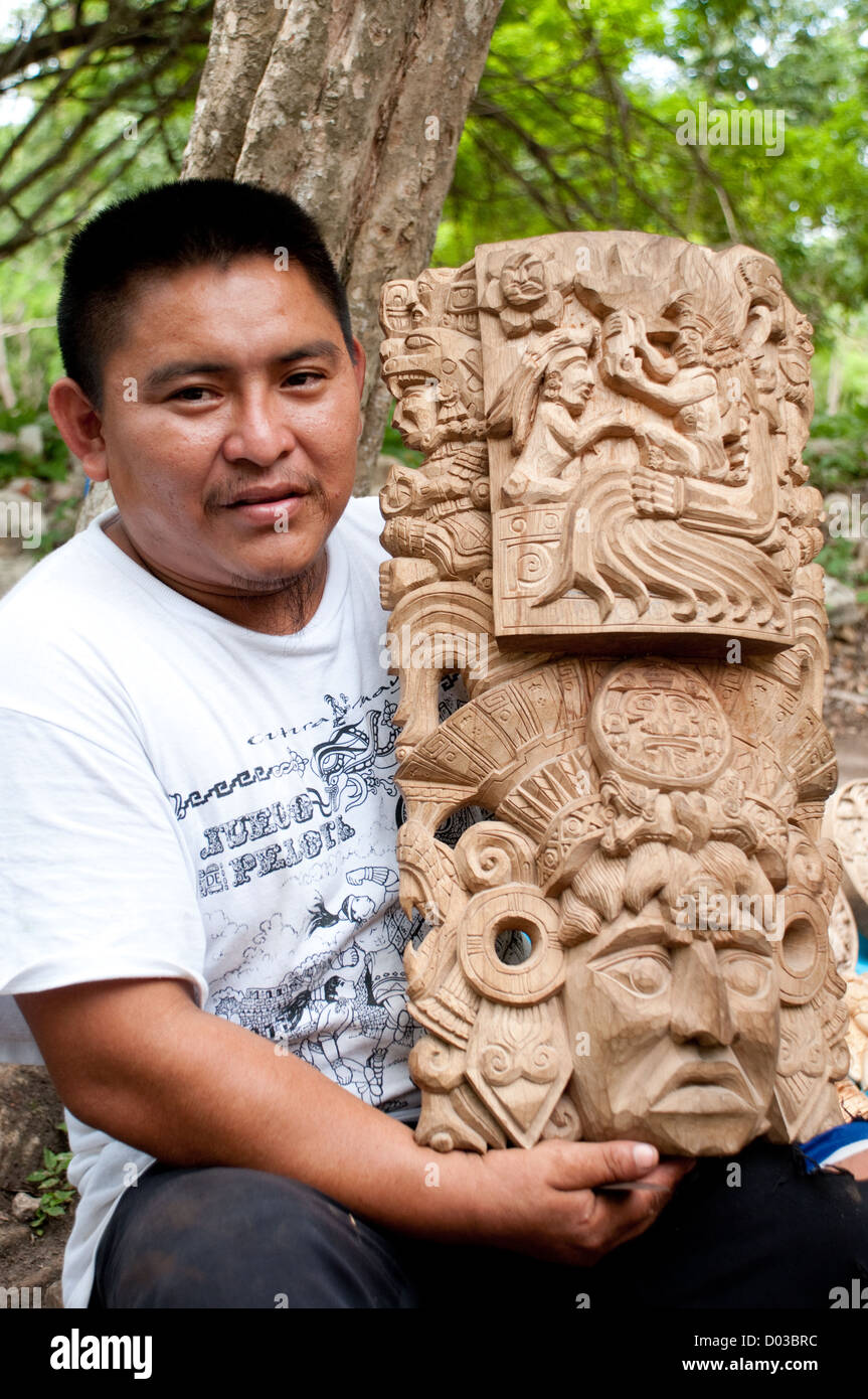 Mexican wood carver artist at Chichen Itza Yucatan Stock Mexican wood carver artist at Chichen Itza Yucatan Stock