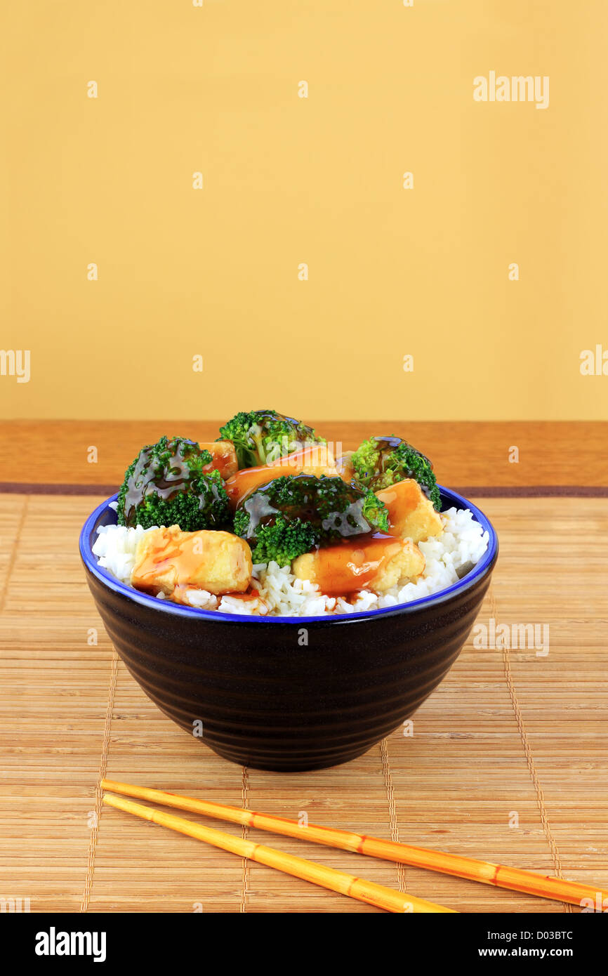 Vegetarian Stir Fry dish of crispy tofu, broccoli and orange sauce with