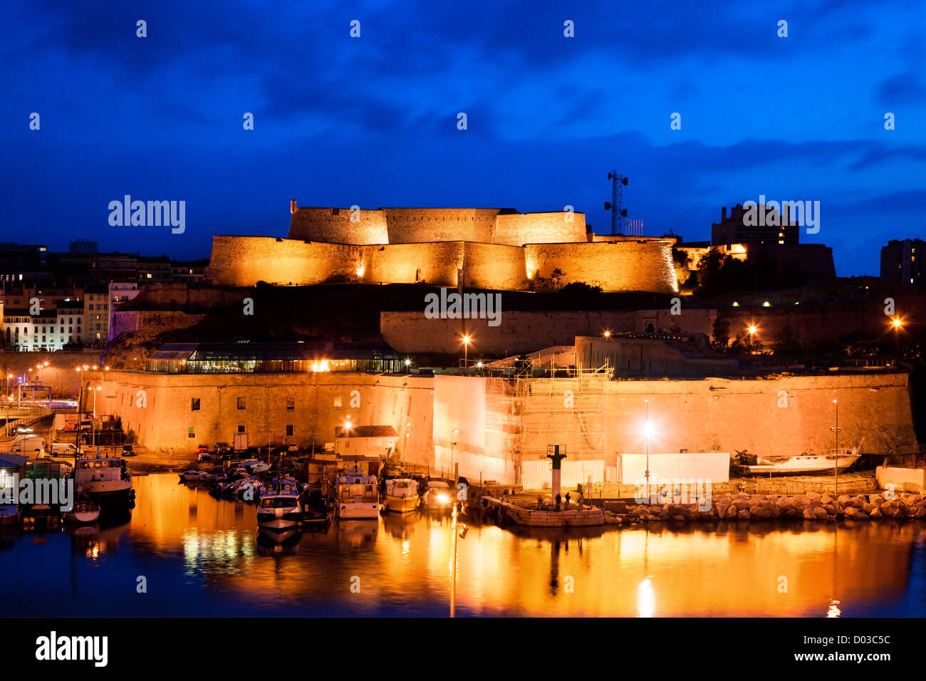 Marseille, France at night. Part of Fort Saint-Jean at the harbour ...